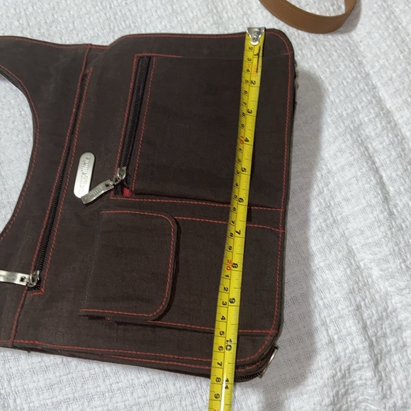 Like new Baggalini Messenger Jetsetter slim Crossbody - Picture 9 of 16